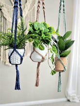 Load image into Gallery viewer, Macrame plant hangers. HANDMADE! custom 15 color choices. 100% cotton. boho style home decor. bohemian houseplant holder. plant lover gift