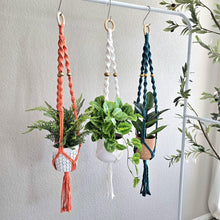 Load image into Gallery viewer, Macrame plant hangers. HANDMADE! Ready to ship. 100% cotton. boho style home decor. bohemian houseplant holder. plant lover gift