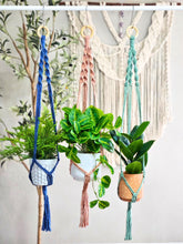 Load image into Gallery viewer, Macrame plant hangers. HANDMADE! custom 15 color choices. 100% cotton. boho style home decor. bohemian houseplant holder. plant lover gift