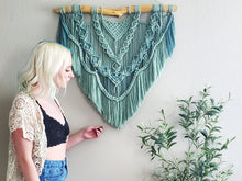 Load image into Gallery viewer, Macrame wall hanging. Green wall decor. bohemian wall decor. Boho wall art. Large macrame hanger.