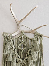 Load image into Gallery viewer, handmade boho macrame wall hanging on an antler
