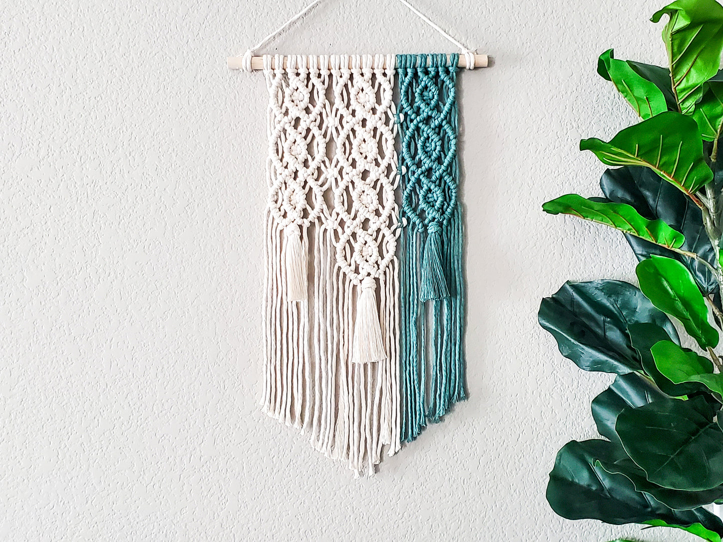 Green and natural geometric macrame wall hanging