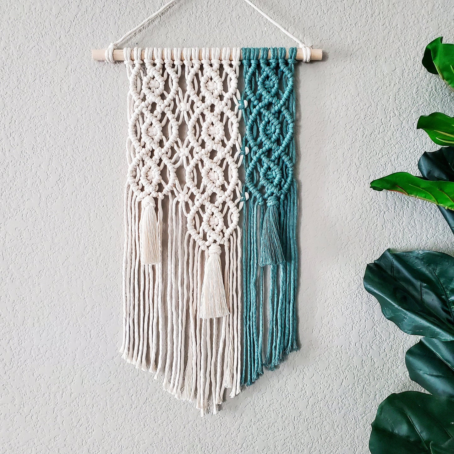 Green and natural geometric macrame wall hanging