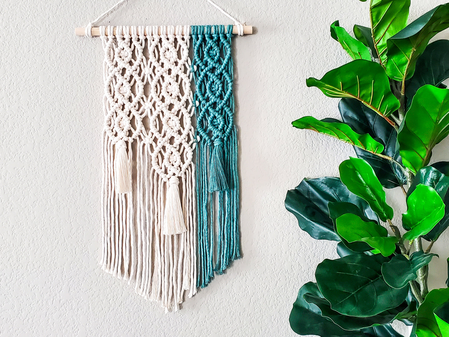 Green and natural geometric macrame wall hanging