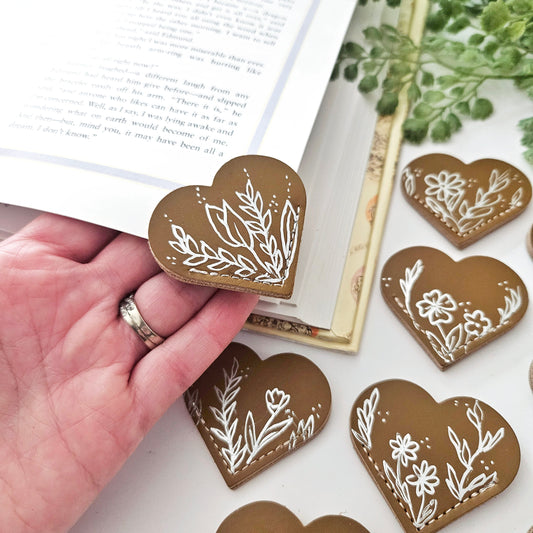 Leather Heart Bookmarks with Exquisite Hand-Drawn Metallic Botanical Designs for book lovers.